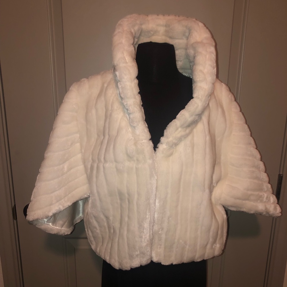 White faux fur coat